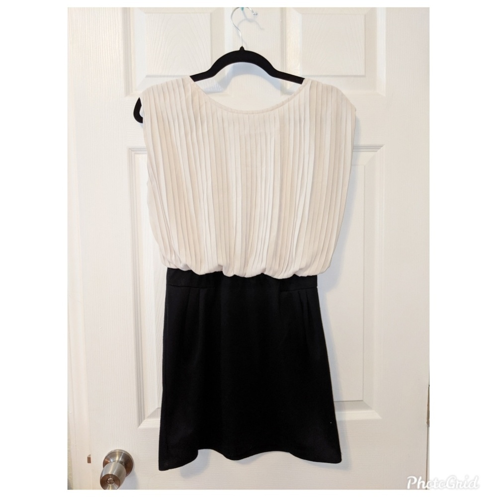 Backless black and white mini dress